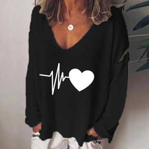 Detail of V-neck long sleeve top with creative heart pulse print for women