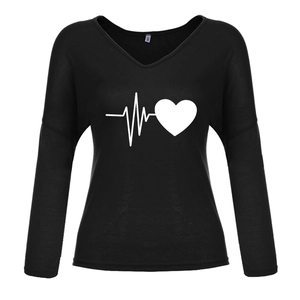 Close-up of black V-neck long-sleeve T-shirt featuring white heart and ECG graphic print