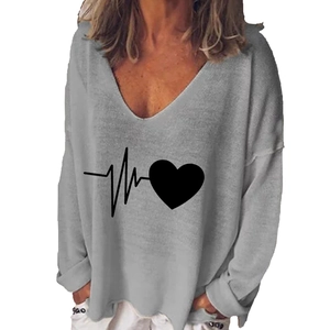 Detail of grey V-neck long sleeve shirt featuring a black heart pulse graphic design
