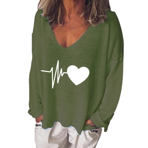 Detail of army green V-neck long sleeve top with creative white heart print design