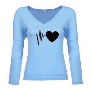 Detail of light blue V-neck top showing M-size tag and black heart print on fabric