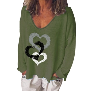 Detail of olive green V-neck long sleeve tee featuring triple heart graphic on knit fabric