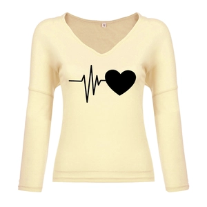 Detail of V-neck long sleeve top in cream with black heartbeat and heart print design
