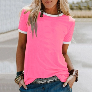 Close-up of bright pink t-shirt featuring contrast white ringer collar and sleeve cuffs