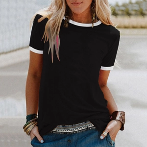 Detail of a vintage black ringer t-shirt with white contrast ribbing on neck and sleeves