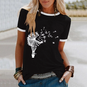 Close-up of dandelion and hot air balloon print on black short-sleeved t-shirt