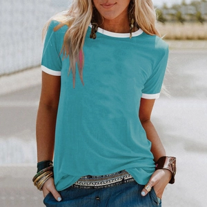 Detail of teal ringer t-shirt with white contrast trim and bohemian accessories