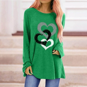 Close-up of heart print detail on emerald green long sleeve loose T-shirt for women