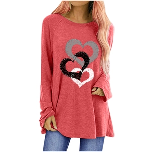 Detail of overlapping heart prints on red long-sleeve casual sweatshirt for women