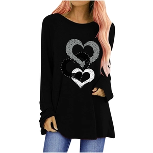 Women's black long sleeve tunic featuring three artistic overlapping heart prints