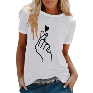 Close-up of a white cotton t-shirt featuring a minimalist black finger heart graphic