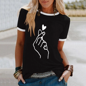 Detail of black ringer t-shirt with heart gesture print and white contrast neck trim