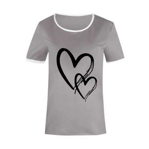 Detail of grey t-shirt showing contrast white trim neckline and heart print graphics
