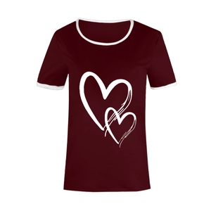 Detail of burgundy t-shirt featuring white heart print and contrasting neckline trim