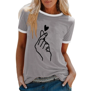 Close-up of heart gesture print on a grey casual t-shirt with white contrast crew neck