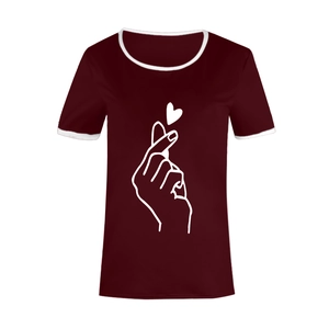 Close-up of heart gesture print and white contrast trim on burgundy cotton t-shirt