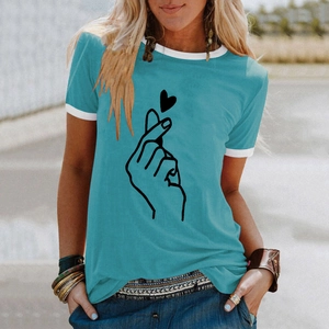 Detail of lake blue ringer tee with finger heart graphic and contrast white trim