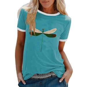 Detail of teal t-shirt featuring colorful dragonfly print and white contrast neckline