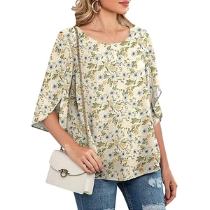 Close-up of elegant floral print top with slit flared sleeves and round neckline