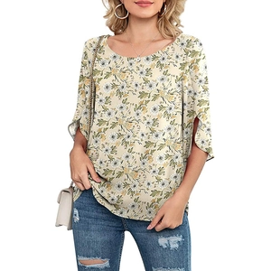 Close-up of elegant floral print chiffon blouse with side-split three-quarter sleeves