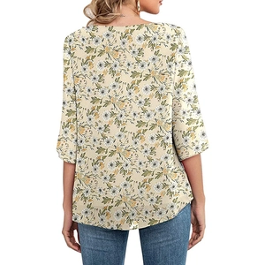Rear view of women's round neck blouse with 3/4 sleeves and white daisy floral pattern