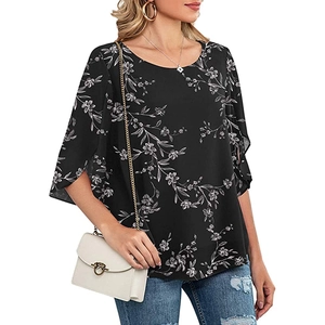 Detail of elegant black floral chiffon top featuring split cape sleeves and round neck