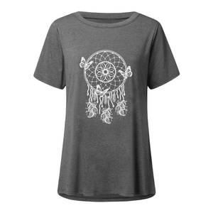 Close-up of dreamcatcher butterfly print and textured fabric on dark grey casual t-shirt