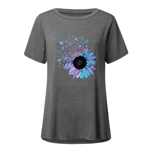 Detailed view of dark heather grey t-shirt featuring sunflower and puzzle piece artwork