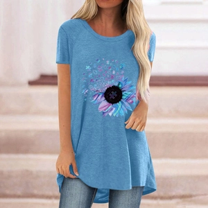 Detail of sunflower puzzle print on light blue crew neck T-shirt for women