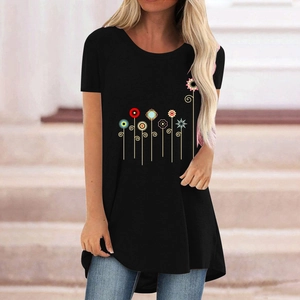 Detail of colorful floral print on black t-shirt with asymmetric curved hemline