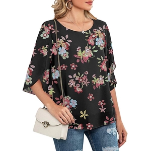 Detail of split ruffle sleeves on elegant floral print blouse for women with casual fit