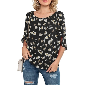 Detail of elegant floral print top with 3/4 split sleeves and scoop neckline