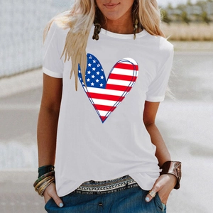 Close-up of heart-shaped American flag print on white cotton T-shirt for Independence Day