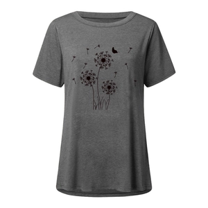 Detailed view of the dandelion and butterfly print on dark grey cotton blend t-shirt