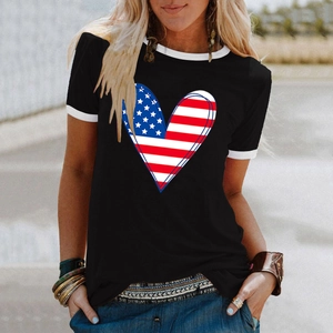 Close-up of black T-shirt with heart-shaped USA flag print and white contrast trim