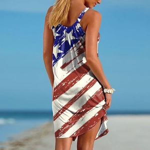 Detail of a sleeveless summer dress with American flag print on a beach background