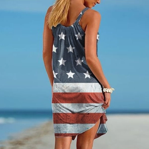 Back view of summer sleeveless dress with vintage American flag pattern on a sunny beach