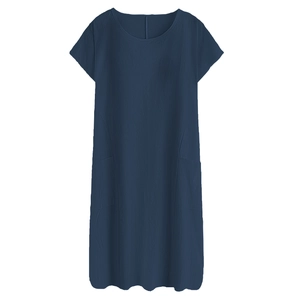 Detail view of a loose navy blue short sleeve dress with practical side pockets
