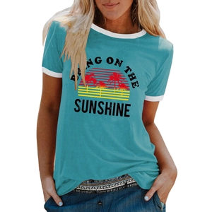 Women's blue ringer t-shirt with sunshine palm tree print on a white background