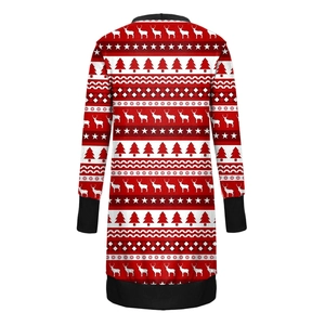 Detail view of Christmas pattern with reindeer and snowflakes on red cardigan back