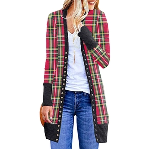 Detail of red plaid Christmas cardigan with black trim and buttons for women