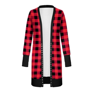 Detail of red and black buffalo plaid cardigan with silver metal snap buttons