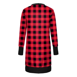 Detail view of the back of a festive red and black buffalo plaid Christmas cardigan