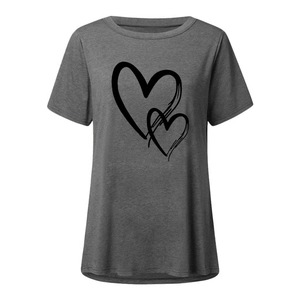 Close-up of overlapping black heart prints on dark gray short sleeve cotton t-shirt