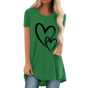 Close-up of heart print detail and curved hemline on dark green short sleeve T-shirt