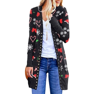 Detail of Christmas cardigan with snowflake and candy cane prints and metal buttons
