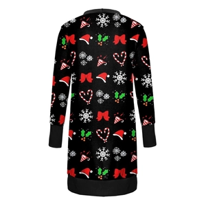 Detail of Christmas themed patterns and snowflake prints on the back of a black cardigan