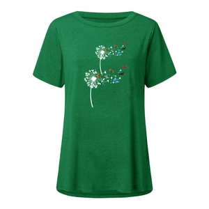 Detail of the colorful dandelion and butterfly print on a dark green cotton T-shirt