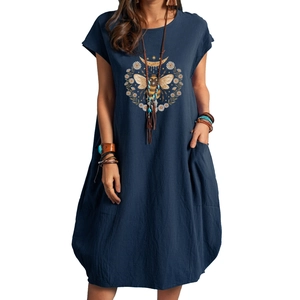 Navy linen dress with bee and daisy print, featuring a loose fit and side pockets