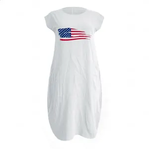 Detailed macro view of the natural linen texture and US flag print on a white summer dress